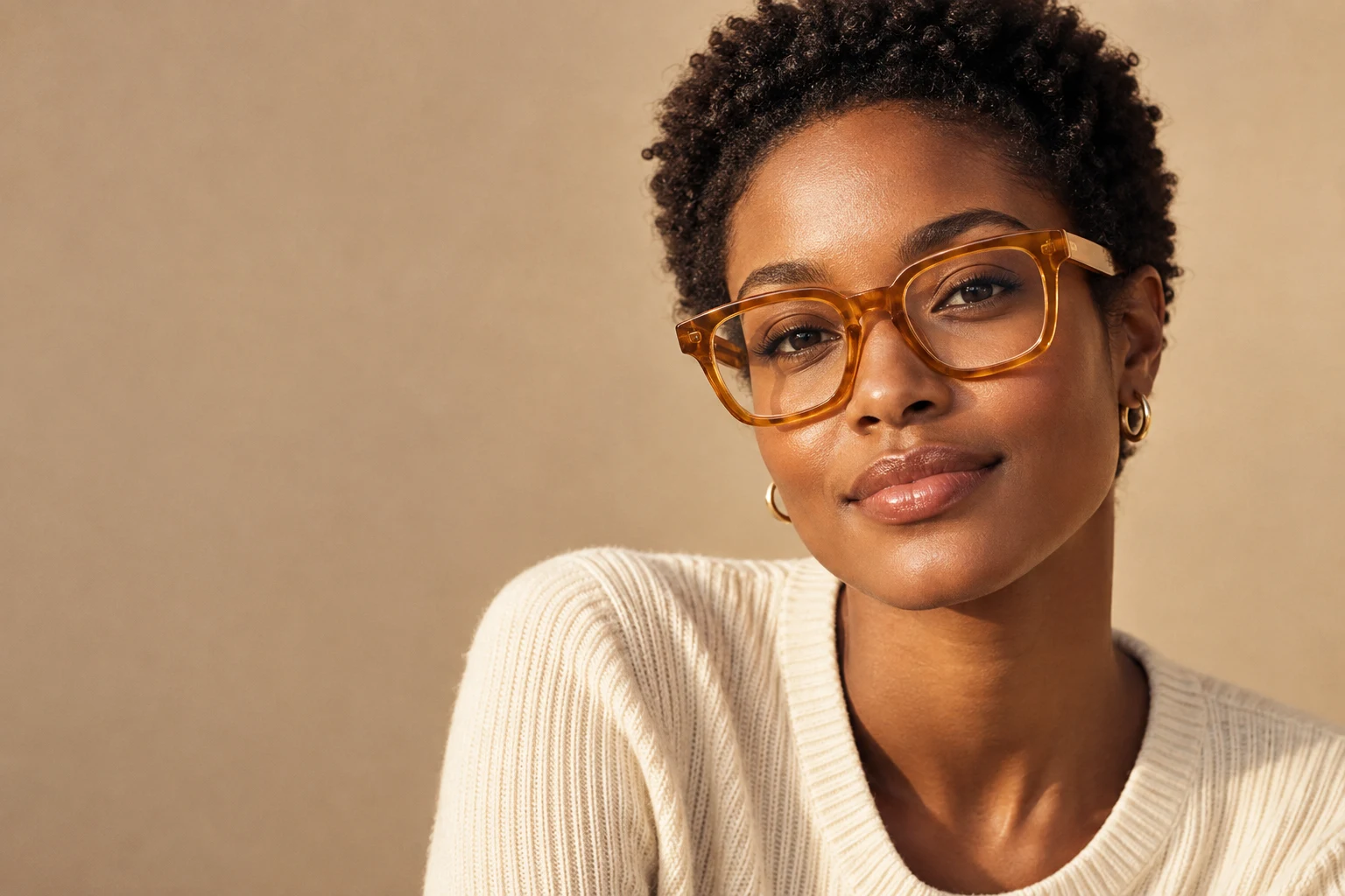 Woman wearing honey-coloured optical frames